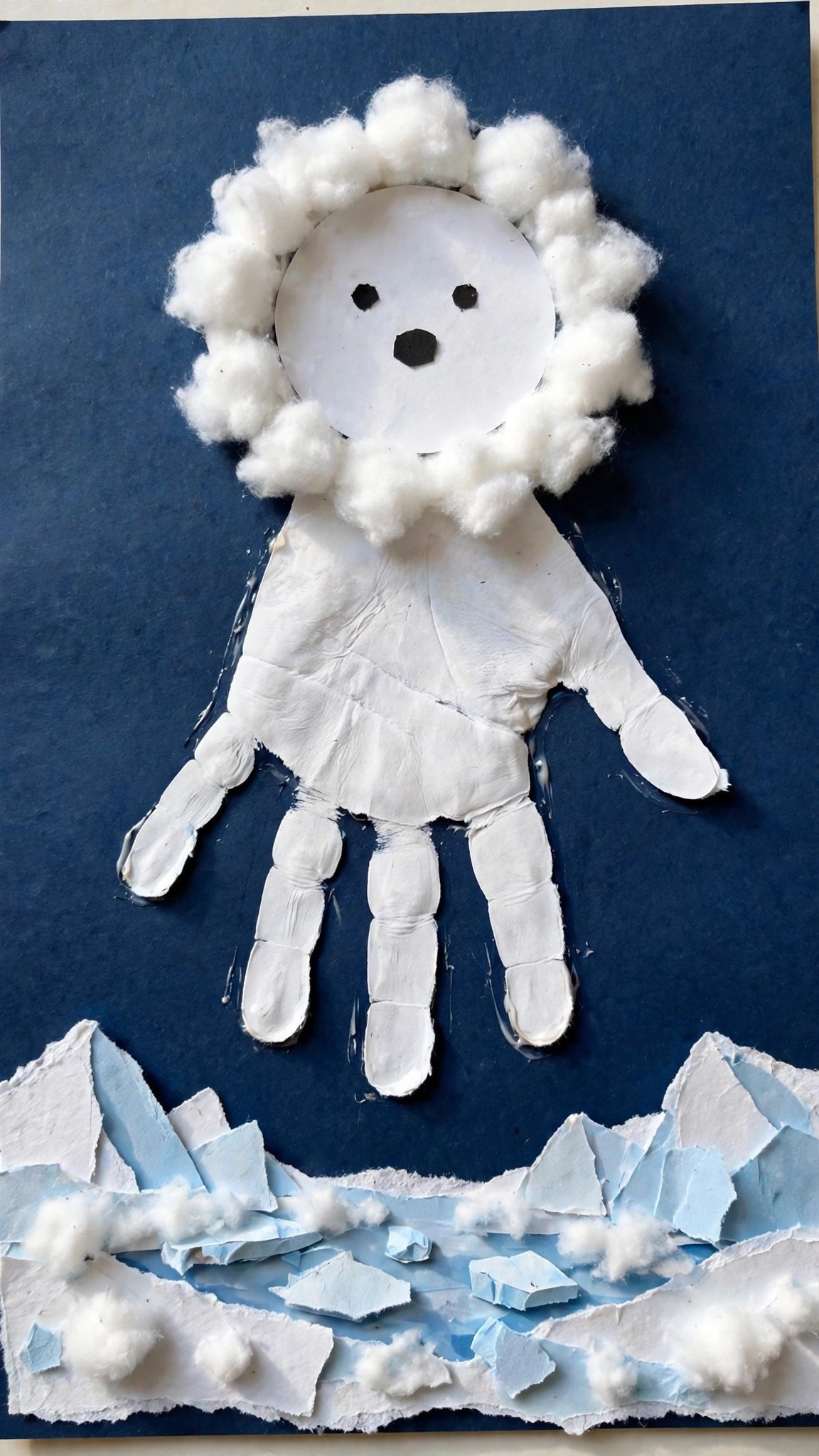 Handprint polar bear craft with cotton ball fur